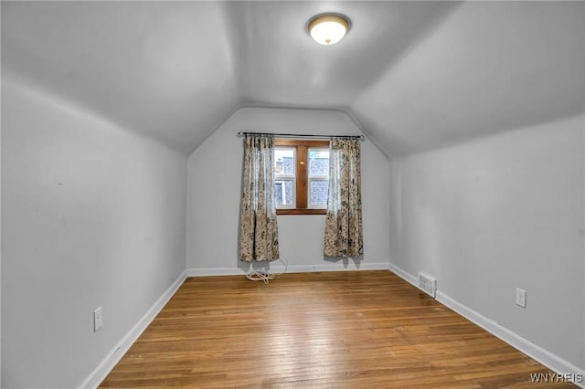 25 Cresthaven Dr, Cheektowaga, NY 14225 - bonus room with wood finished floors and vaulted ceiling
