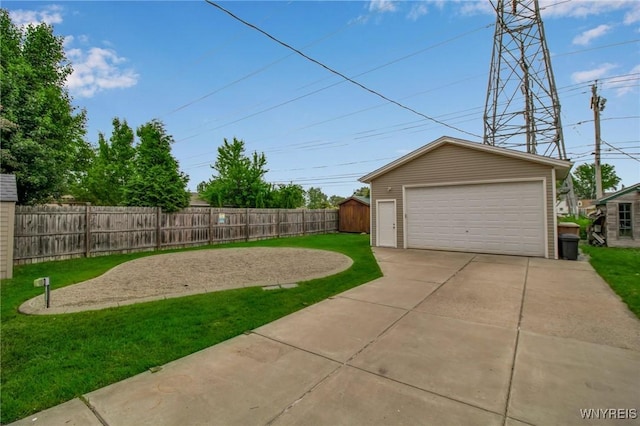 25 Cresthaven Dr, Cheektowaga, NY 14225 - view of yard featuring a detached garage and a storage unit