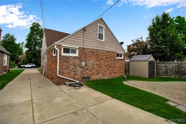 25 Cresthaven Dr, Cheektowaga, NY 14225 - view of property exterior with brick siding and a storage unit