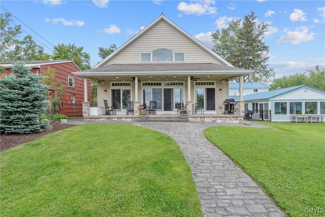32 Coblesub Rd, West Monroe, NY 13036 - rear view of house with a yard, a porch, and roof with shingles