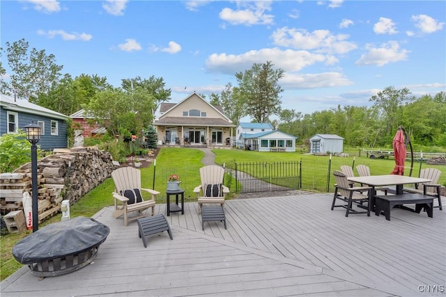 32 Coblesub Rd, West Monroe, NY 13036 - deck featuring outdoor dining space, a yard, a shed, and an outdoor fire pit