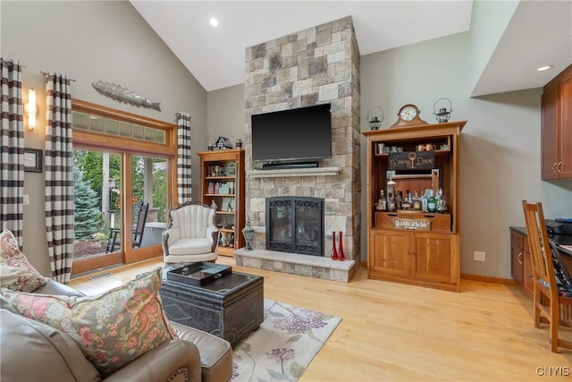 32 Coblesub Rd, West Monroe, NY 13036 - living room with a stone fireplace, wood finished floors, high vaulted ceiling, and recessed lighting
