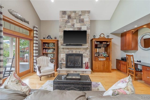 32 Coblesub Rd, West Monroe, NY 13036 - living room with a fireplace, light wood finished floors, high vaulted ceiling, and recessed lighting