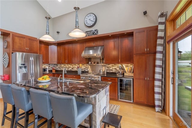32 Coblesub Rd, West Monroe, NY 13036 - kitchen featuring beverage cooler, under cabinet range hood, high vaulted ceiling, stainless steel fridge with ice dispenser, and backsplash