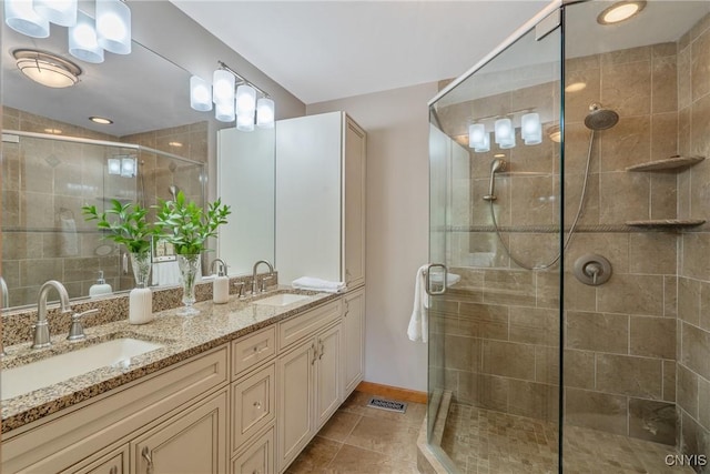 32 Coblesub Rd, West Monroe, NY 13036 - bathroom featuring double vanity, a stall shower, and tile patterned flooring
