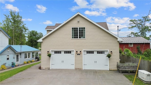 32 Coblesub Rd, West Monroe, NY 13036 - view of side of home with a garage