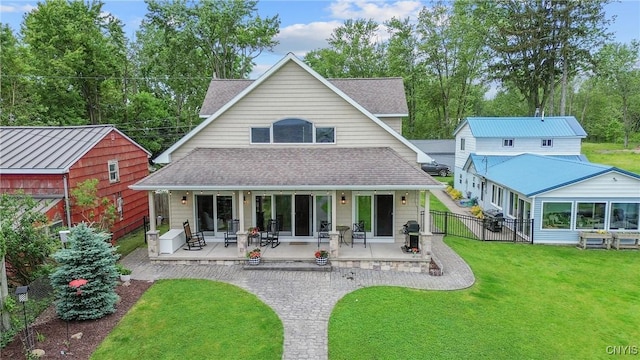 32 Coblesub Rd, West Monroe, NY 13036 - back of house with a shingled roof, a patio area, and a gate
