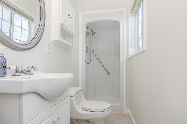 2761 Mount Read Blvd, Greece, NY 14616 - bathroom with walk in shower, vanity, and tile patterned flooring