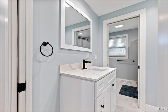 7446 Collamer Rd, Manlius, NY 13057 - bathroom with marble finish flooring and vanity