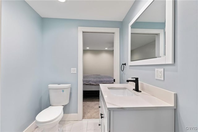 7446 Collamer Rd, Manlius, NY 13057 - ensuite bathroom with baseboards and vanity