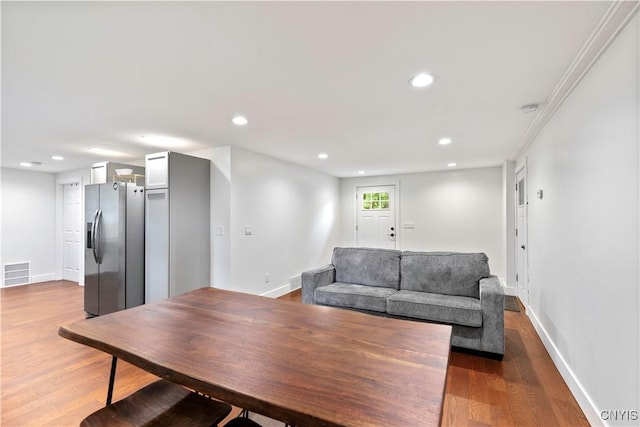 7446 Collamer Rd, Manlius, NY 13057 - living area with wood finished floors and recessed lighting