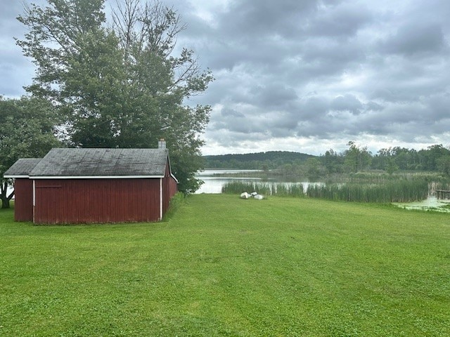 2226 Deiter Rd, Wayland, NY 14572 - view of green lawn with a water view and an outbuilding