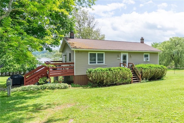 2226 Deiter Rd, Wayland, NY 14572 - view of front of house with a chimney, a front lawn, and a deck
