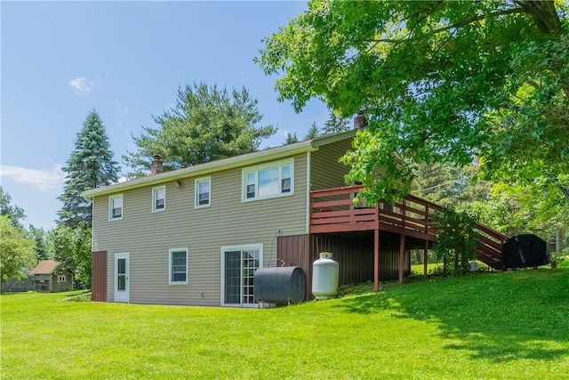 2226 Deiter Rd, Wayland, NY 14572 - rear view of property with a chimney, oil tank, a yard, and a deck