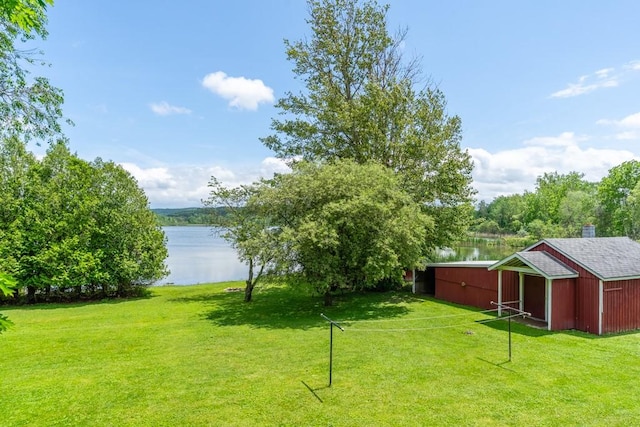 2226 Deiter Rd, Wayland, NY 14572 - view of green lawn with a water view, an outbuilding, and an outdoor structure
