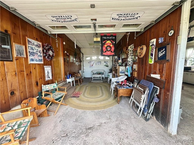 9718 Pearson Rd, Hartland, NY 14105 - miscellaneous room featuring a garage and wooden walls