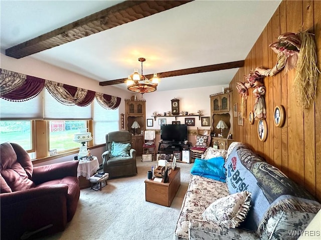 9718 Pearson Rd, Hartland, NY 14105 - living room with carpet floors, beam ceiling, wood walls, and a chandelier