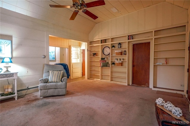 711 Sandy Ave, Evans, NY 14006 - sitting room featuring vaulted ceiling, a ceiling fan, carpet, built in shelves, and a baseboard heating unit