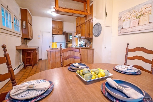 711 Sandy Ave, Evans, NY 14006 - dining area featuring baseboard heating
