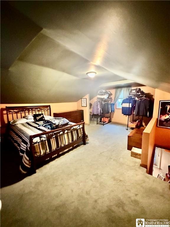 417 4th Ave, Olean-City, NY 14760 - carpeted bedroom featuring lofted ceiling