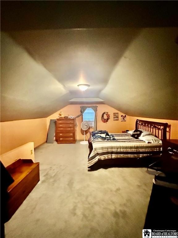 417 4th Ave, Olean-City, NY 14760 - carpeted bedroom with lofted ceiling
