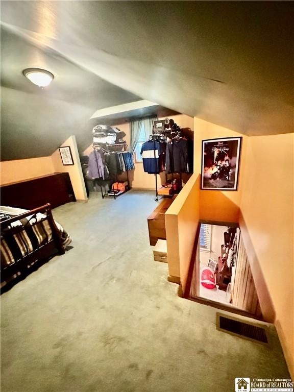417 4th Ave, Olean-City, NY 14760 - bedroom with carpet flooring and lofted ceiling