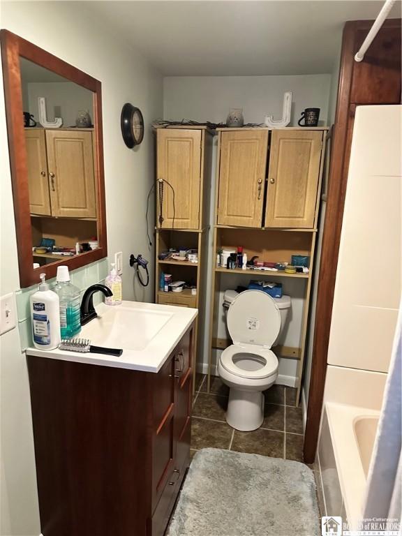 417 4th Ave, Olean-City, NY 14760 - bathroom featuring vanity and tile patterned floors