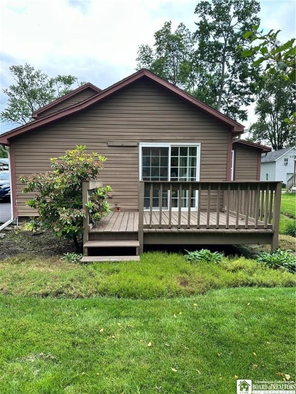 417 4th Ave, Olean-City, NY 14760 - back of property featuring a deck and a lawn