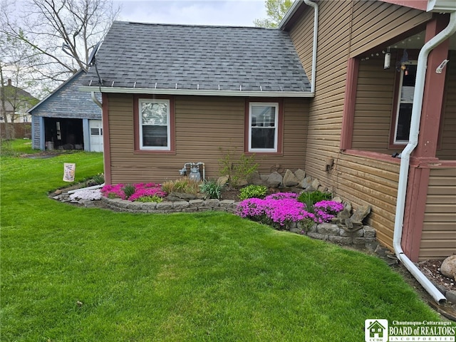 417 4th Ave, Olean-City, NY 14760 - view of home's exterior with roof with shingles and a yard