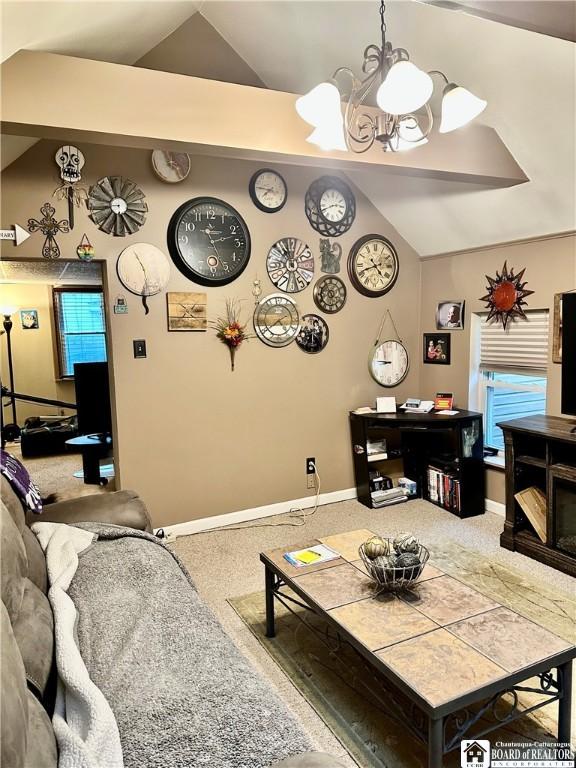 417 4th Ave, Olean-City, NY 14760 - living area with lofted ceiling, a chandelier, and carpet