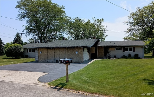 69 Steele Cir, Niagara, NY 14304 - ranch-style home with a front yard