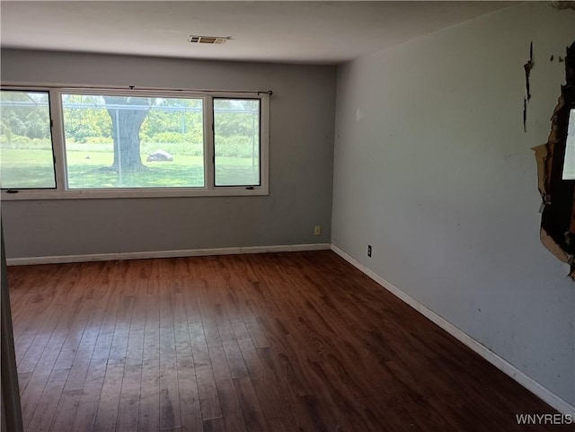 69 Steele Cir, Niagara, NY 14304 - unfurnished room featuring wood-type flooring and baseboards