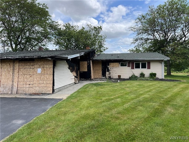 69 Steele Cir, Niagara, NY 14304 - ranch-style home with a front lawn