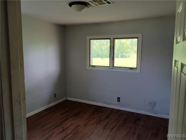 69 Steele Cir, Niagara, NY 14304 - unfurnished room featuring dark wood-type flooring and baseboards
