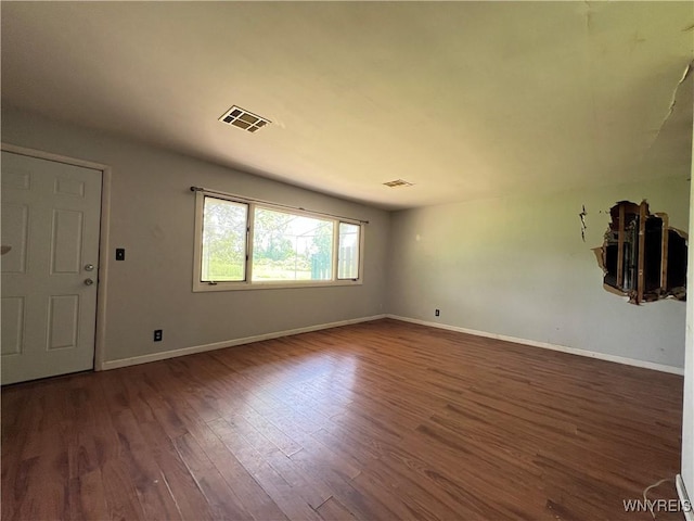 69 Steele Cir, Niagara, NY 14304 - empty room featuring wood finished floors and baseboards