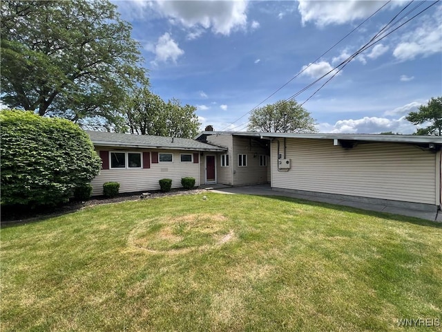 71 Steele Cir, Niagara, NY 14304 - back of house featuring a yard
