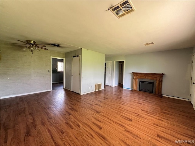 71 Steele Cir, Niagara, NY 14304 - unfurnished living room featuring wood finished floors, a fireplace, and ceiling fan