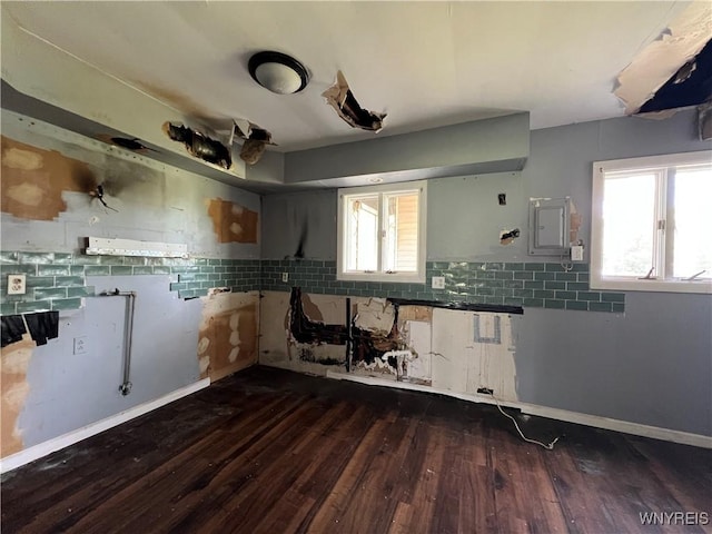 71 Steele Cir, Niagara, NY 14304 - kitchen featuring plenty of natural light, decorative backsplash, and wood finished floors