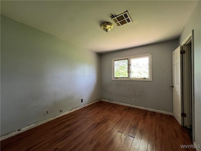 71 Steele Cir, Niagara, NY 14304 - unfurnished bedroom with wood finished floors and baseboards