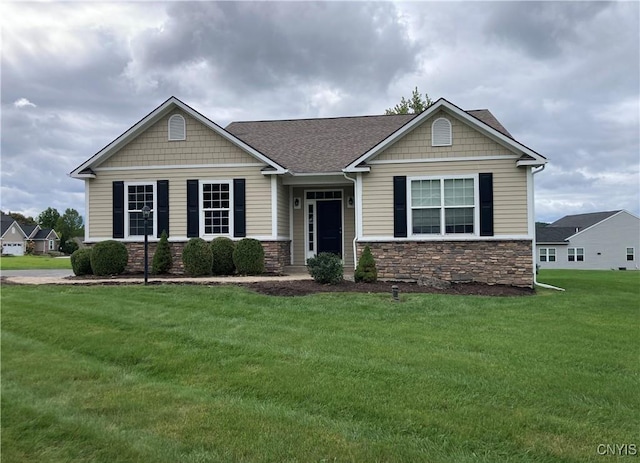 165 Shaker Hts, Camillus, NY 13031 - craftsman inspired home featuring stone siding, a front yard, and a shingled roof
