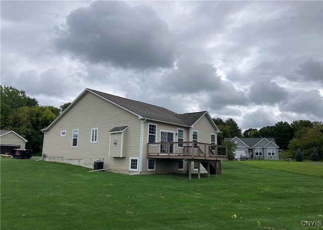 165 Shaker Hts, Camillus, NY 13031 - rear view of property featuring a lawn and a wooden deck