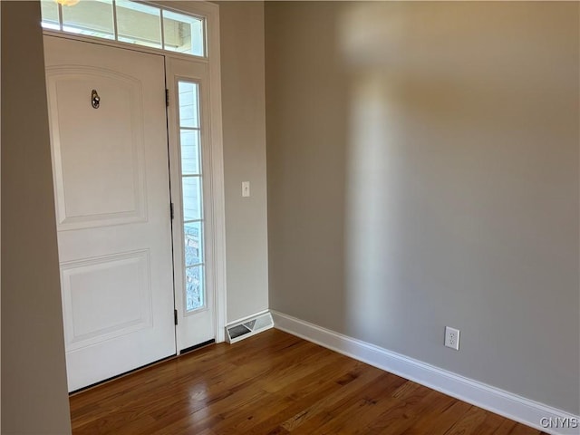 165 Shaker Hts, Camillus, NY 13031 - entryway with baseboards and dark wood-style floors