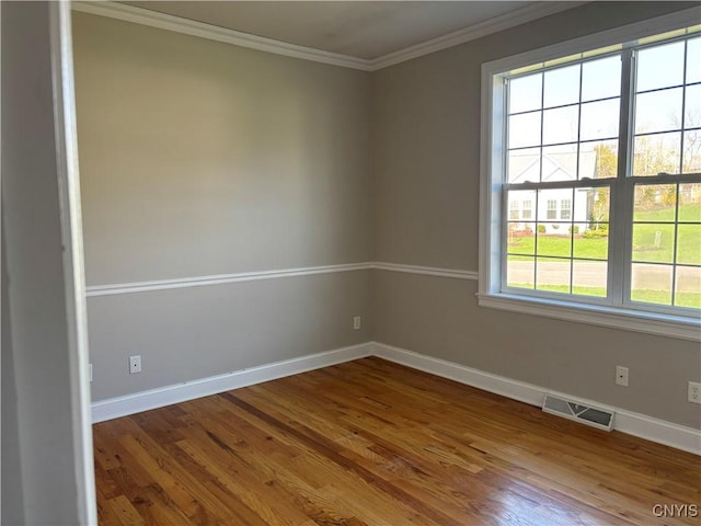 165 Shaker Hts, Camillus, NY 13031 - unfurnished room featuring wood finished floors and crown molding
