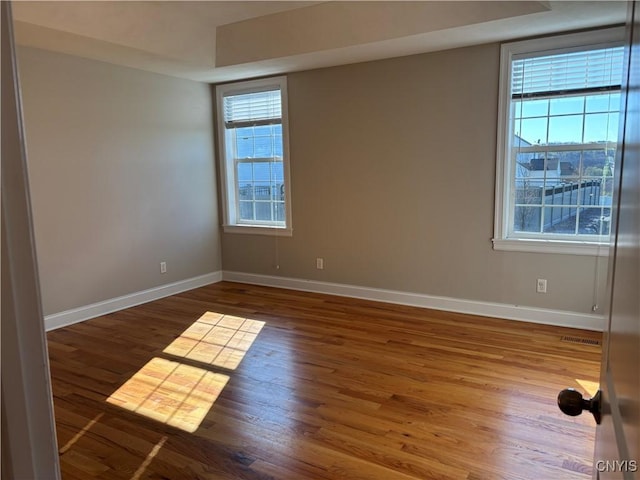 165 Shaker Hts, Camillus, NY 13031 - empty room featuring wood finished floors and baseboards