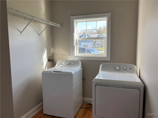 165 Shaker Hts, Camillus, NY 13031 - laundry room with washer and dryer and wood finished floors