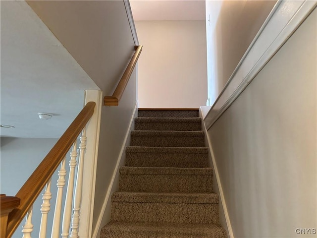 165 Shaker Hts, Camillus, NY 13031 - stairway with baseboards and carpet