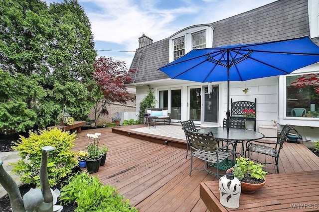 177 Foxpoint W, Amherst, NY 14221 - wooden deck with outdoor dining space
