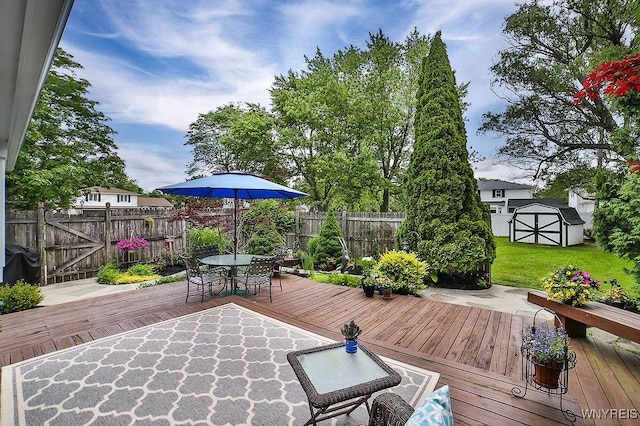 177 Foxpoint W, Amherst, NY 14221 - wooden terrace with a shed, a fenced backyard, and outdoor dining space