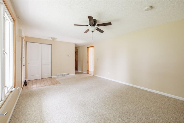 72 Juliane Dr, Gates, NY 14624 - spare room with a ceiling fan, carpet flooring, a smoke detector, and a textured ceiling