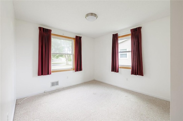 72 Juliane Dr, Gates, NY 14624 - unfurnished room featuring healthy amount of natural light and carpet floors